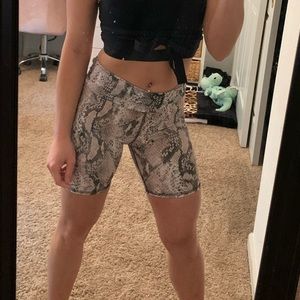 Snakeskin biker shorts.